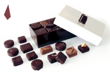 Chocolaterie Lamy. Bonbons de chocolat noir au lait